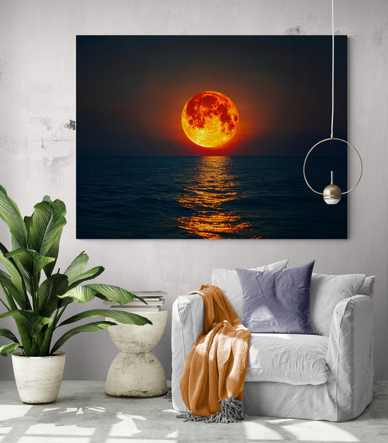 Déco murale coucher de soleil sur mer pour salon cosy avec plante verte et accents orange et violet