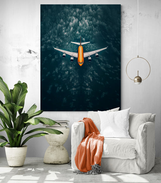 ableau avion épuré, complétant l'ambiance épurée d'un coin lecture