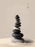 Cairn de galets empilés en équilibre sur sable, style zen, avec un arrière-plan circulaire apaisant