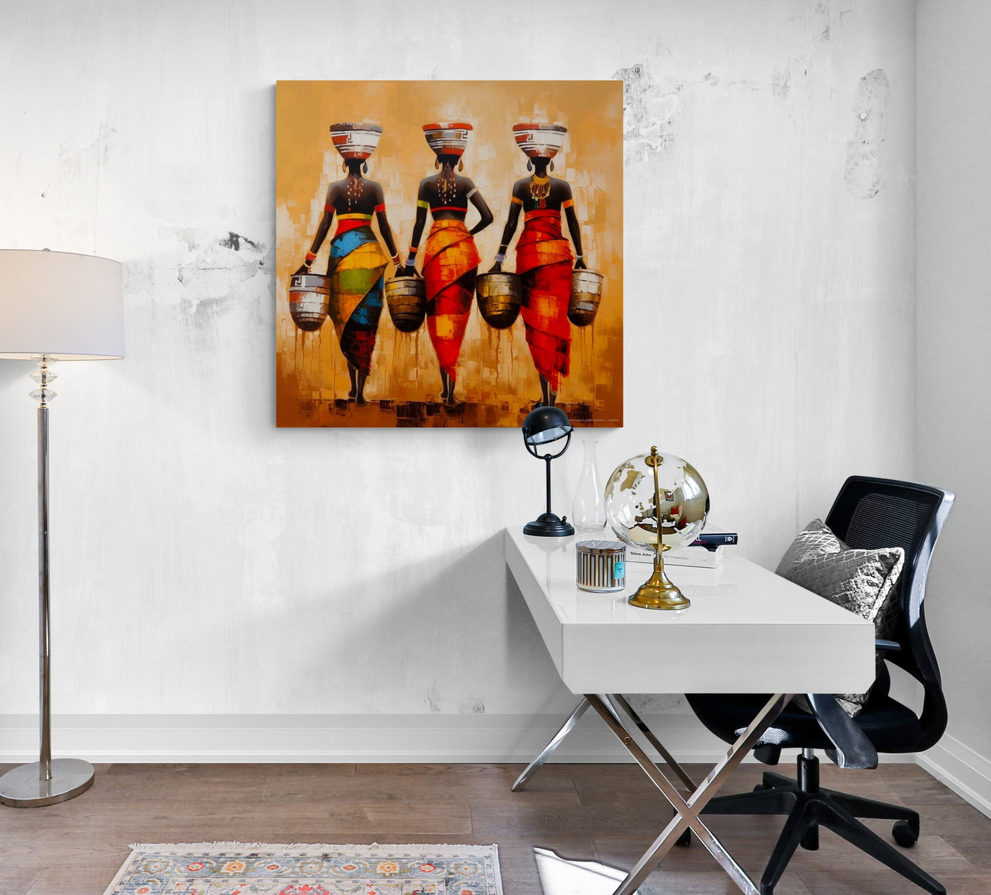 Accroché dans un bureau, le tableau "Trois Femmes Africaines" inspire la créativité et l'évasion, apportant une touche artistique à l'environnement de travail.