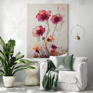 Un fauteuil moelleux accompagné d’un plaid vert tendre offre un coin détente idéal, sublimé par un tableau floral grand format. La peinture, avec ses teintes éclatantes de rose et de rouge, dynamise l’espace tout en restant élégante. Les plantes et les éléments naturels présents dans la décoration accentuent la douceur et le côté chaleureux de cet espace de repos