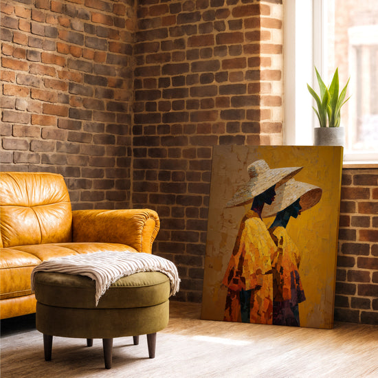 Tableau africain femmes chapeaux paille tons jaunes orangés décoration salon mur brique fauteuil cuir