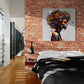 Dans une chambre adulte de style loft avec mur en brique, le Tableau Femme Africaine Coloré apporte une touche d'art africain moderne