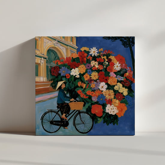 Tableau fleurs multicolores sur vélo style naïf, présentation produit toile au sol décoration murale