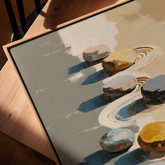 Tableau galets zen sur sable pour salon minimaliste