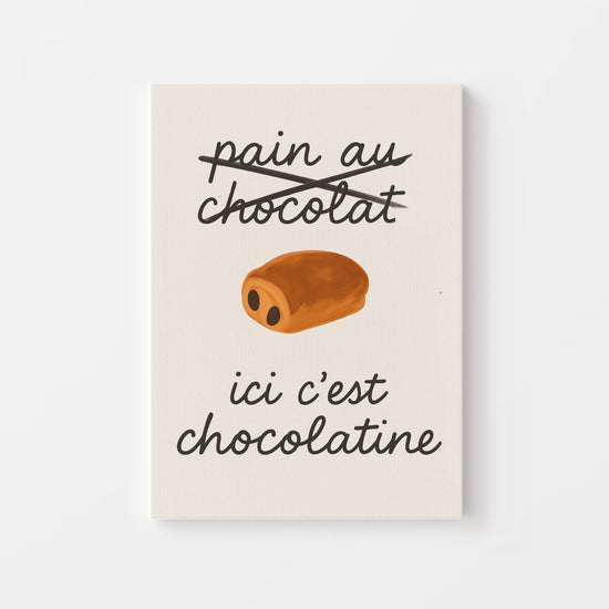 Tableau humoristique de chocolatine sur fond blanc avec texte en style manuscrit, décoration ludique