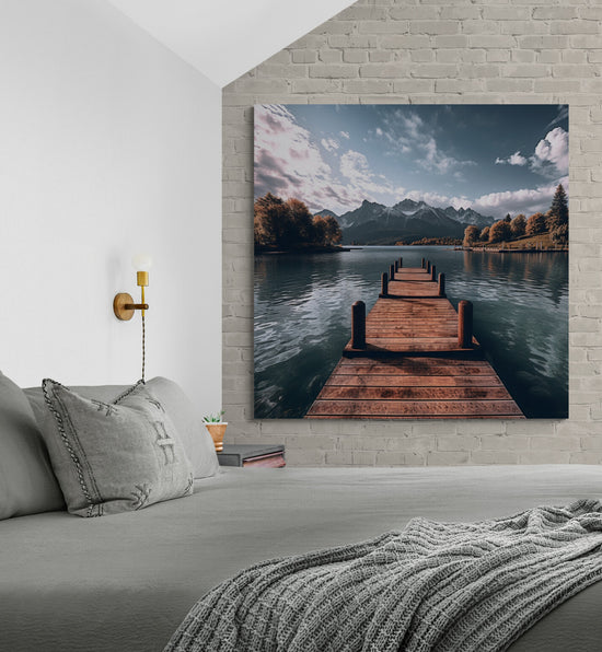 Chambre reposante avec vue sur un tableau lacustre, évoquant la tranquillité.