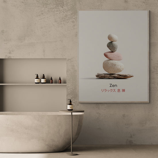 Grand tableau zen avec galets et calligraphie japonaise installé dans une salle de bain design avec baignoire moderne, murs en béton clair et table d’appoint pour accessoires de bain, décoration relaxante et élégante
