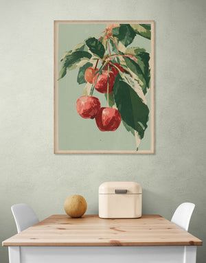 Tableau mural avec cerises rouges et feuillage vert sur fond vert, ambiance rustique et naturelle en salle à manger