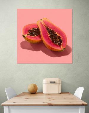 Tableau mural de papayes colorées sur fond rose pour une cuisine moderne