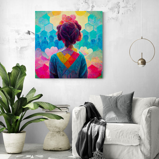 Tableau de déco coloré sur le mur d'un salon. Une jeune fille y est représentée, le regard empli de bienveillance et de positivité. Elle semble voir le monde comme un endroit merveilleux, rempli de possibilités et de couleurs. Le jaune, le rose, le bleu et le vert se mêlent harmonieusement pour donner naissance à un univers lumineux et accueillant. Des formes humaines au loin semblent être emplies de bonté. Une vision du monde utopique et optimiste, comme celle que nous portions lorsque nous étions enfant